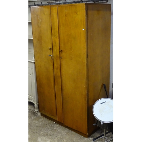 1548 - A Vintage maple walnut gentleman's 2-door fitted wardrobe, bears label to the inside of the door, W1... 