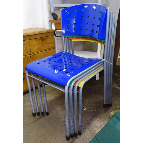 1593 - 4 metal stacking chairs