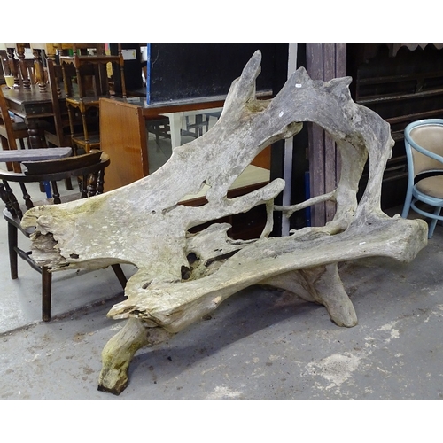 1603 - A decorative rustic root carved garden bench