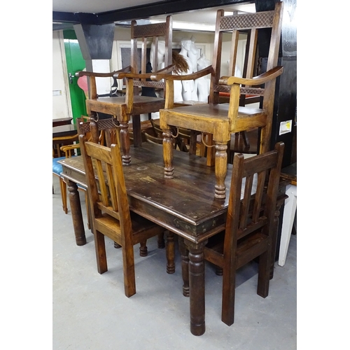 1626 - An Indonesian rectangular hardwood dining table, together with a set of 6 matching chairs (4 and 2)