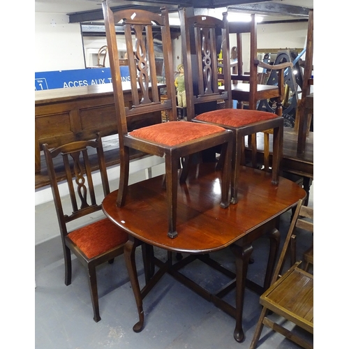 1630 - A mahogany drop leaf dining table on cabriole legs, together with a set of 4 Art Nouveau dining chai... 