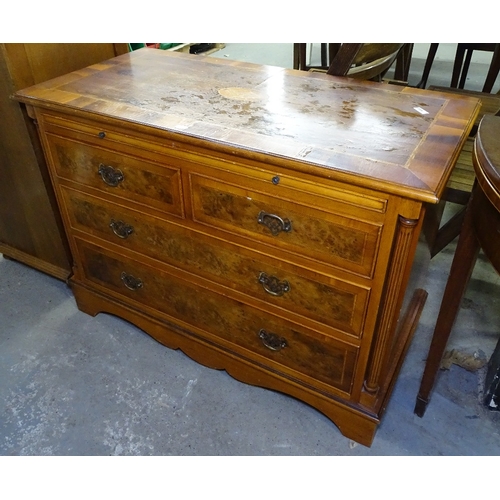 1633 - A reproduction crossbanded yew wood chest, with brushing slide, 2 short and 2 long drawers under, fl... 