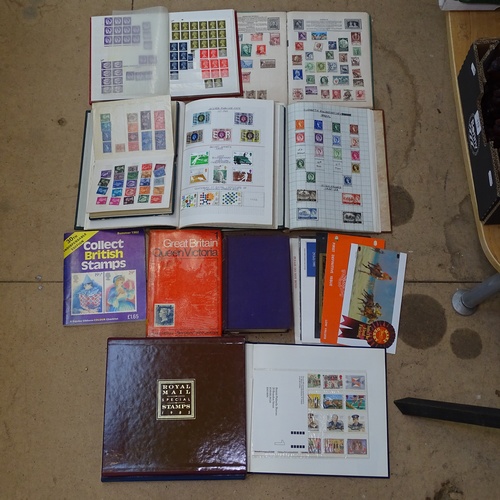 491 - A box containing albums of British and Commonwealth stamps and related books