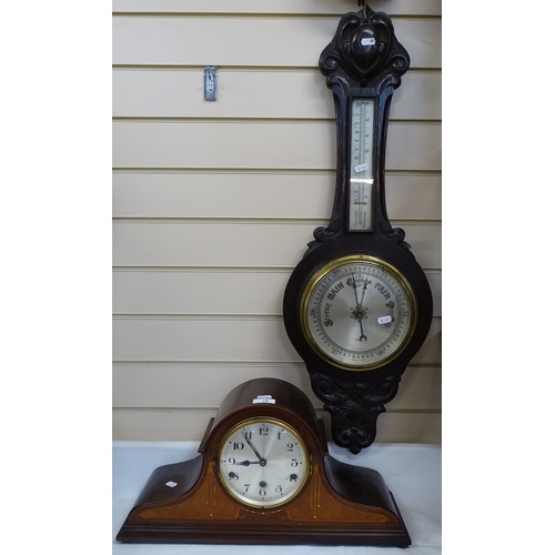 78 - An Art Nouveau mahogany-cased Napoleon-shape mantel clock, with pendulum, length 51cm and a carved o... 