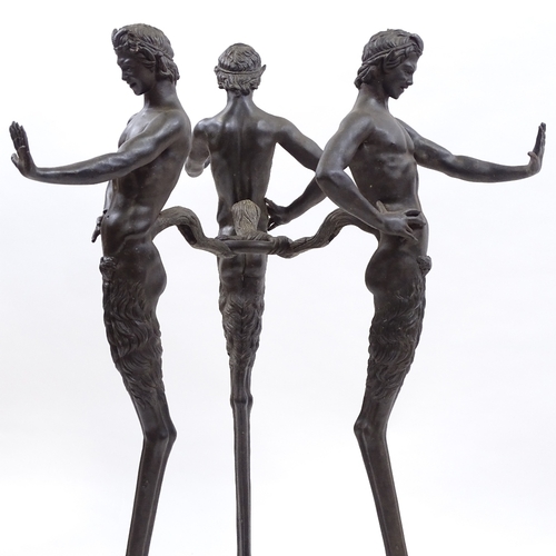 17 - A fine quality 19th century bronze table base in the form of 3 standing satyrs, joined by a central ... 