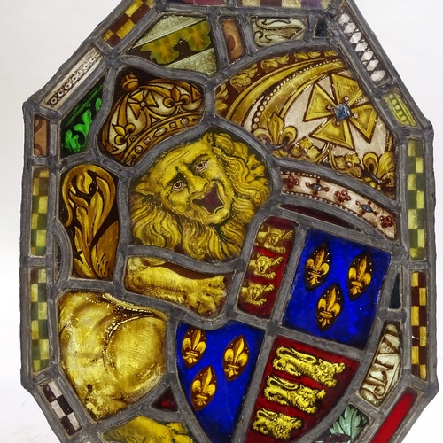 100 - A 19th century stained glass leadlight panel with heraldic lion design, 46cm x 34cm