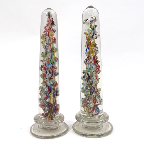 66 - A pair of Victorian glass columns with multi-colour internal glass decoration, height 30cm