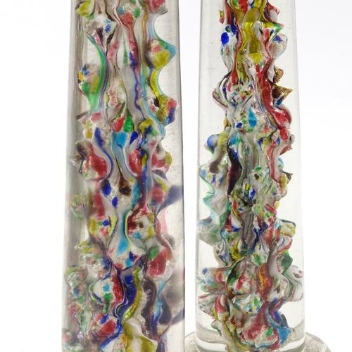 66 - A pair of Victorian glass columns with multi-colour internal glass decoration, height 30cm