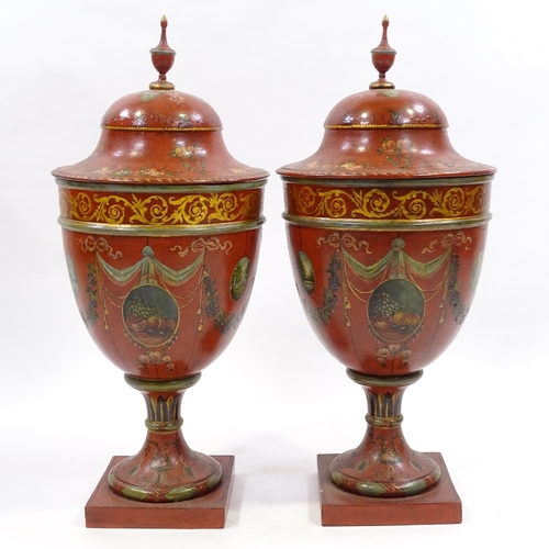 70 - A pair of painted and gilded wooden ornamental urns and covers in Adam style, probably mid-20th cent... 