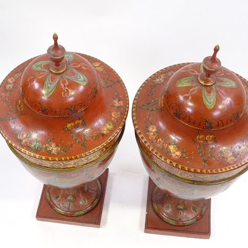 70 - A pair of painted and gilded wooden ornamental urns and covers in Adam style, probably mid-20th cent... 