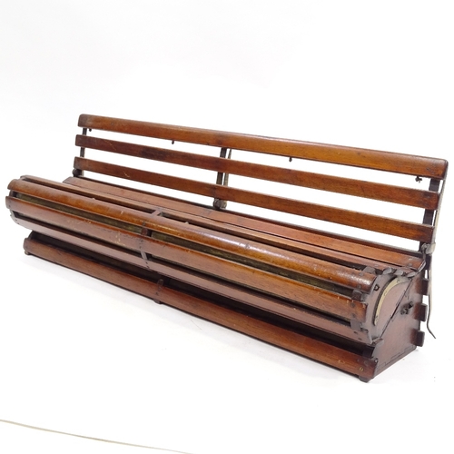 73 - An unusual 19th century mahogany and brass model bench with hinged seat, length 61cm