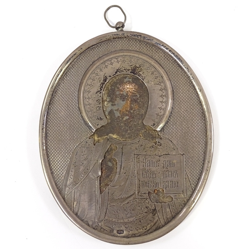 77 - A 19th century Russian silver-mounted oval icon, mount stamped 84, height 13.5cm