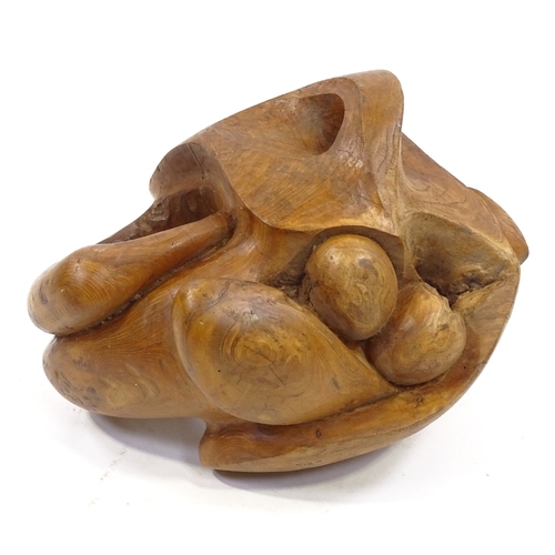 81 - A polished root wood abstract carving, unsigned, length 43cm