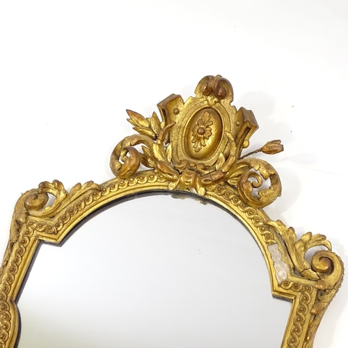 84 - A 19th century gilt-gesso framed wall mirror with shelf below, overall height 1.1m, shelf width 50cm