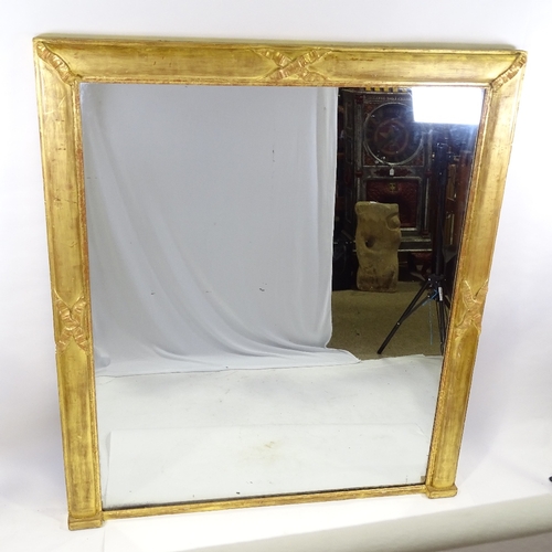 87 - A large 19th century carved giltwood and gesso wall mirror, height 1.62m, width 1.42m