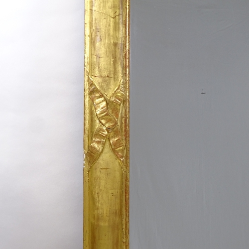 87 - A large 19th century carved giltwood and gesso wall mirror, height 1.62m, width 1.42m