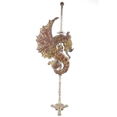 91 - A 19th century painted metal dragon design weather vane on cast-iron stand, overall height 1.94m