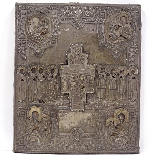 102 - A Russian silver-fronted icon, 18th or 19th century, relief moulded figures of the saints with Cyril... 