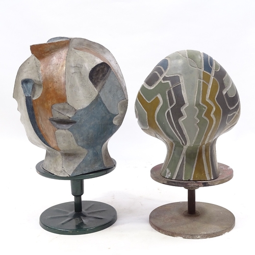 114 - A pair of unusual painted clay sculptures, abstract head compositions, probably mid-20th century, un... 