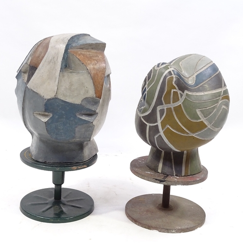 114 - A pair of unusual painted clay sculptures, abstract head compositions, probably mid-20th century, un... 