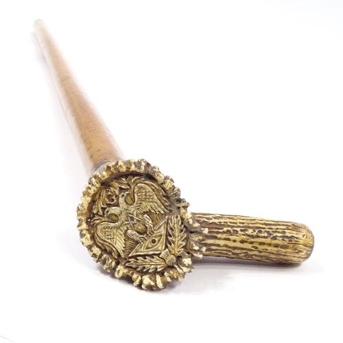 127 - A Malacca walking stick with stag horn handle and carved double-headed eagle Masonic emblem