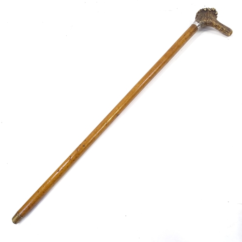 127 - A Malacca walking stick with stag horn handle and carved double-headed eagle Masonic emblem