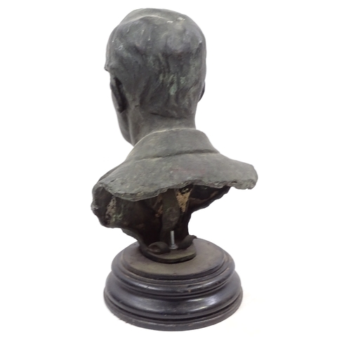 130 - A green patinated bronze bust of a man, late 19th or early 20th century, indistinctly signed, on cir... 