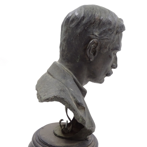 130 - A green patinated bronze bust of a man, late 19th or early 20th century, indistinctly signed, on cir... 