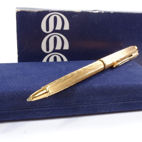 137 - A Waterman Moire pattern gold plated ballpoint pen, boxed