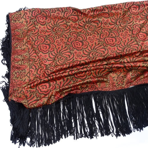 138 - A Chinese hand embroidered red ground floral design silk scarf with black fringe, panel size 136cm x... 