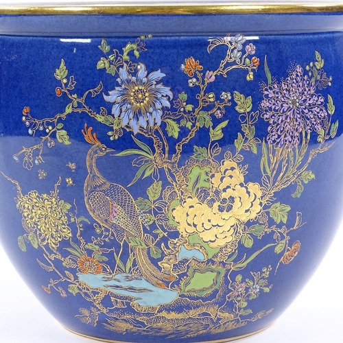 141 - A Carlton Ware Bleu Royale gilded porcelain jardiniere, rim diameter 23cm, height 19cm