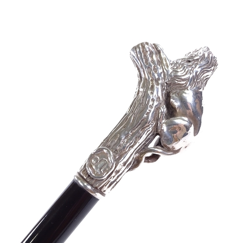 145 - A silver lion-handled walking stick, marked 925