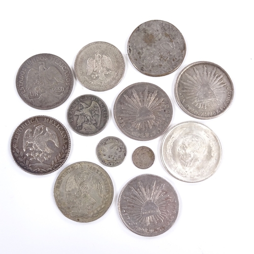 156 - A collection of Mexican 19th - 20th silver coins