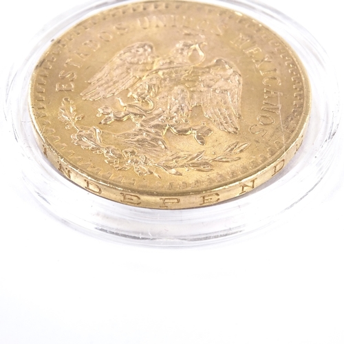 169 - A 1947 Mexican gold 50 pesos coin, 900 fineness, 41.8g