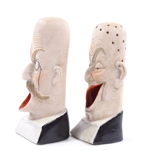 184 - A pair of early 20th century French porcelain novelty caricature design cigarette holders, height 12... 