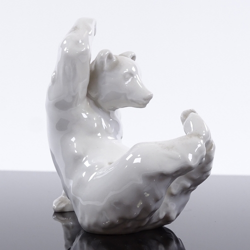 194 - A KPM white glaze porcelain grizzly bear, height 10cm