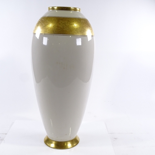 395 - A large German white glaze porcelain vase with gilded bands, height 49cm