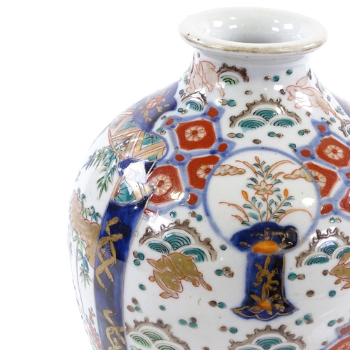 396 - A Chinese famille rose porcelain vase, hand painted enamel decoration and gilded hares, height 21cm