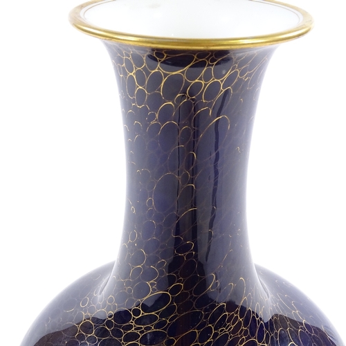 397 - A Continental blue and gilt glaze porcelain narrow-necked vase, height 31cm