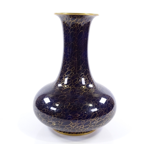 397 - A Continental blue and gilt glaze porcelain narrow-necked vase, height 31cm