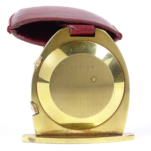 454 - JAEGER LECOULTRE - a gold plated travelling keyring timepiece/clock, silvered dial with gilt baton h... 