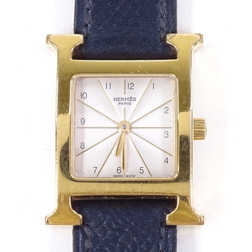 455 - HERMES - a lady's gold plated stainless steel Heure H quartz wristwatch, ref. HH1.201, silvered radi... 