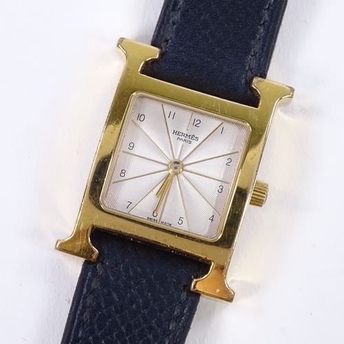 455 - HERMES - a lady's gold plated stainless steel Heure H quartz wristwatch, ref. HH1.201, silvered radi... 