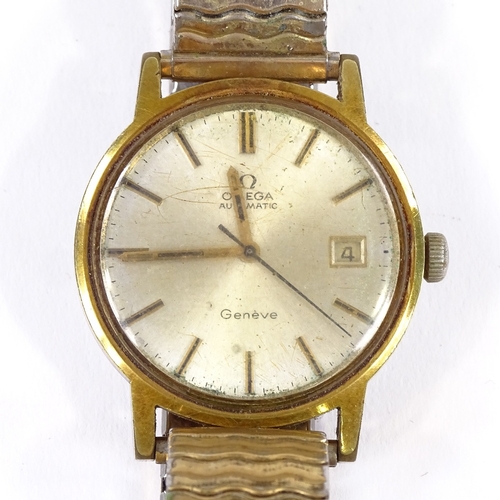 456 - OMEGA - a Vintage gold plated stainless steel Geneve automatic wristwatch, silvered dial with gilt b... 