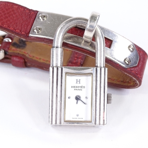 459 - HERMES - a lady's silver-cased Kelly padlock quartz wristwatch, silvered dial with quarterly dot hou... 