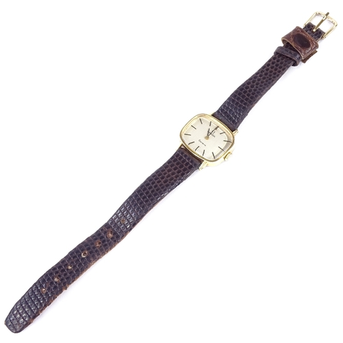 463 - OMEGA - a lady's gold plated stainless steel Geneve mechanical wristwatch, ref. 511.413, silvered di... 