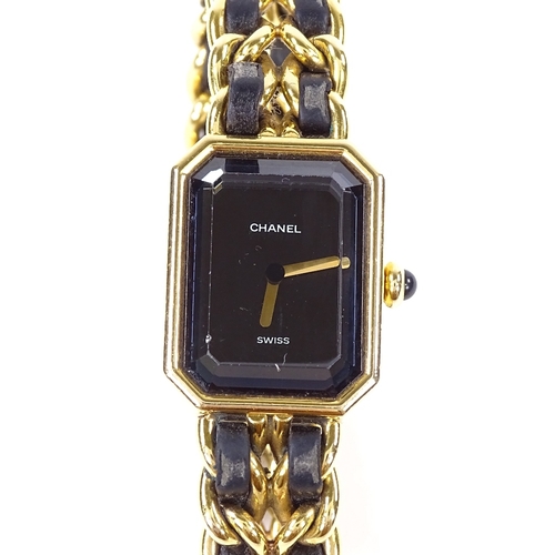 465 - CHANEL - a lady's gold plated and leather Premiere quartz wristwatch, ref. 4 83 01 1002, octagonal b... 