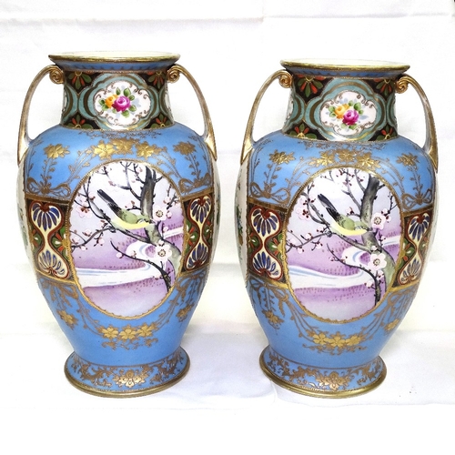 524 - A pair of Japanese blue and gold ground porcelain 2-handled vases, with hand painted bird decorated ... 