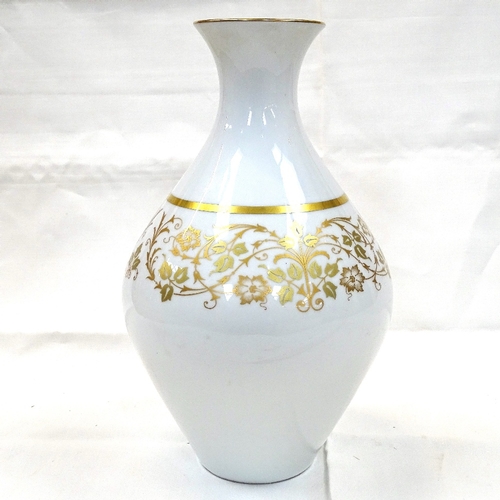 525 - A German porcelain gilded vase, 31cm