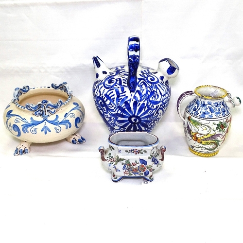 529 - A group of Italian and French faience pottery items, largest flagon height 28cm (4)